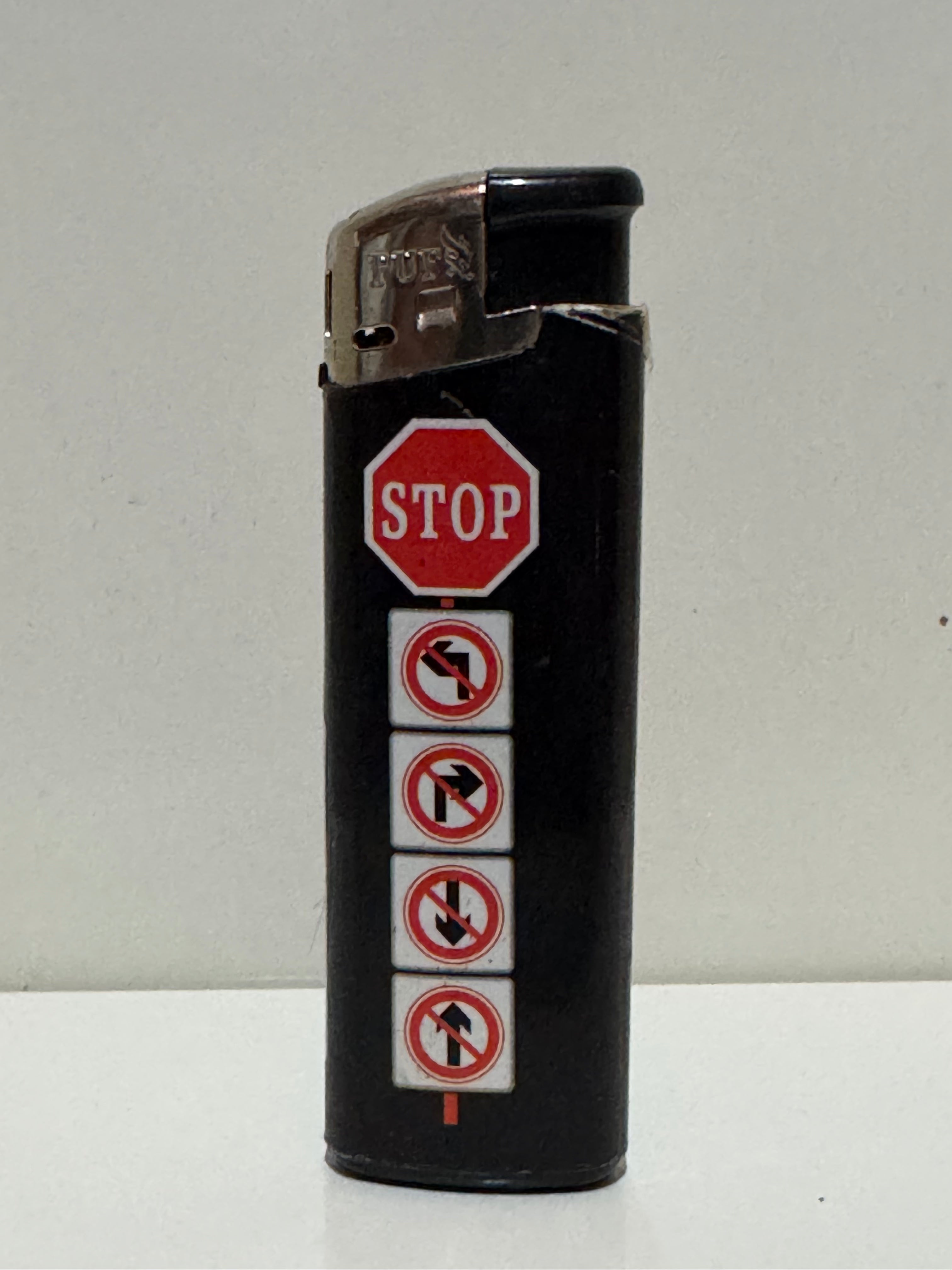 STOP road sign lighter – black graphic design