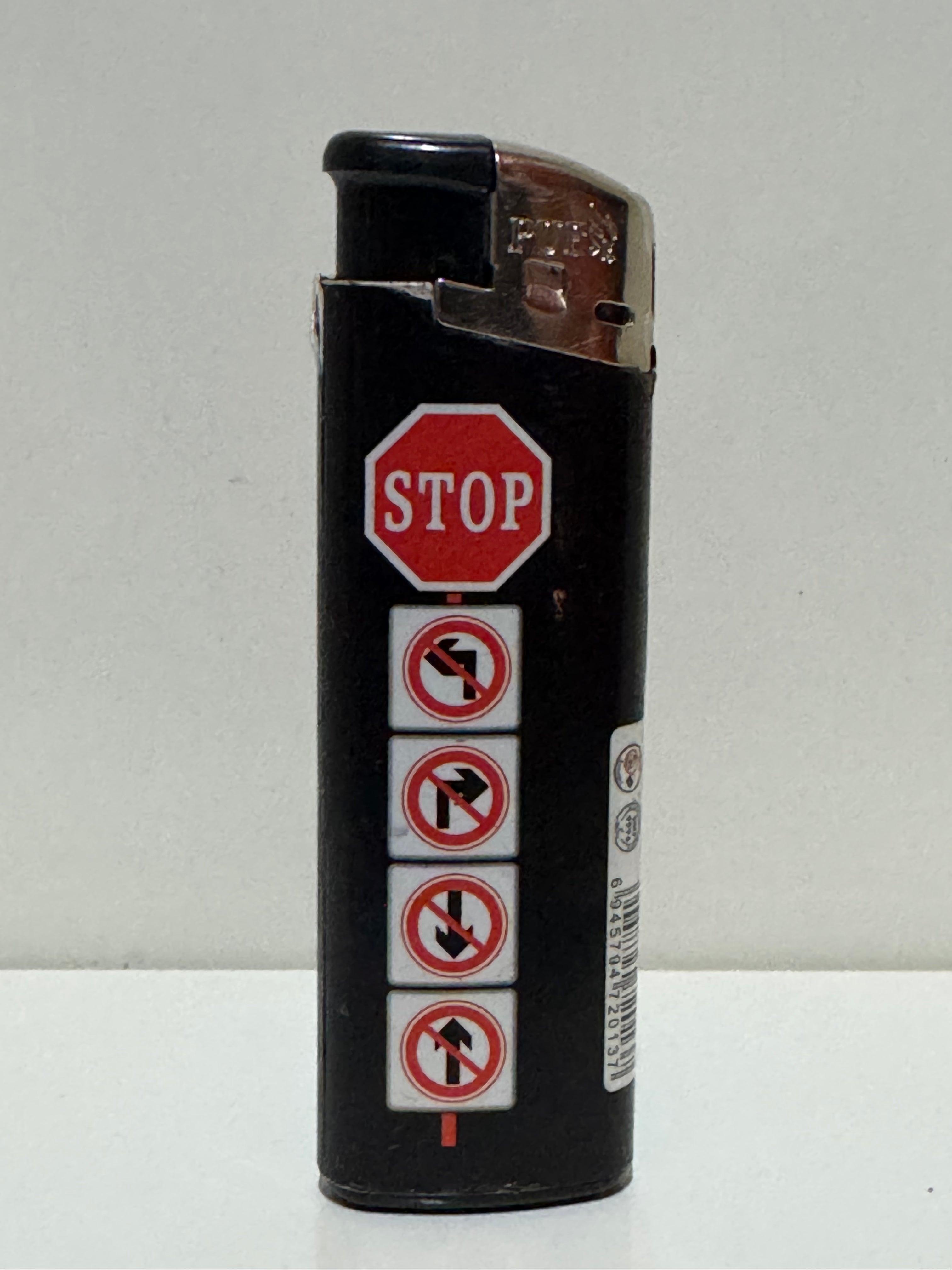 STOP road sign lighter – black graphic design