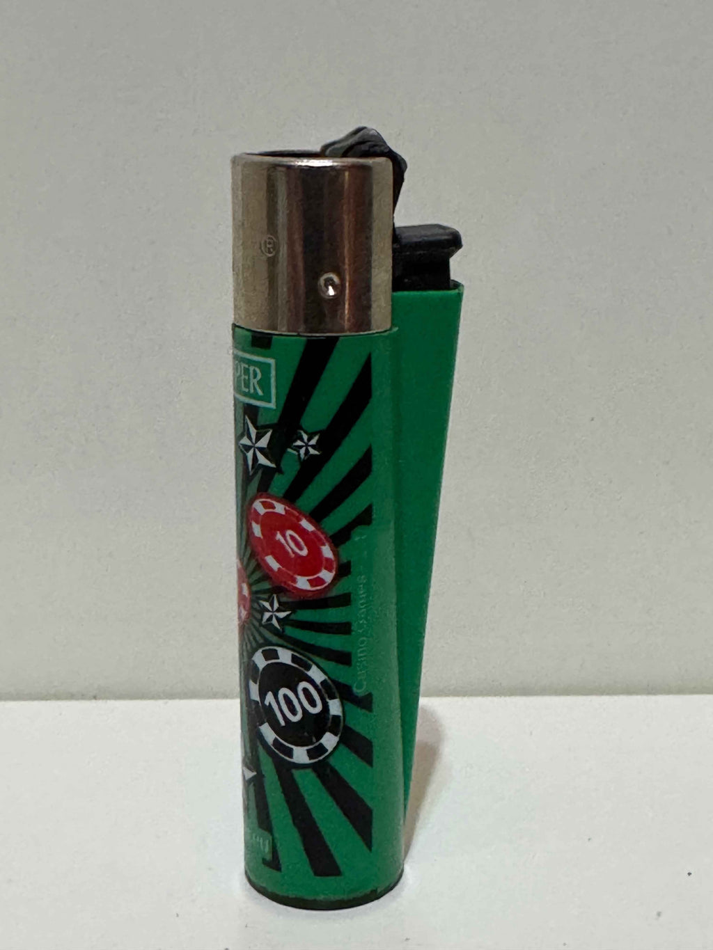 Clipper casino poker chip lighter – green pop-art design