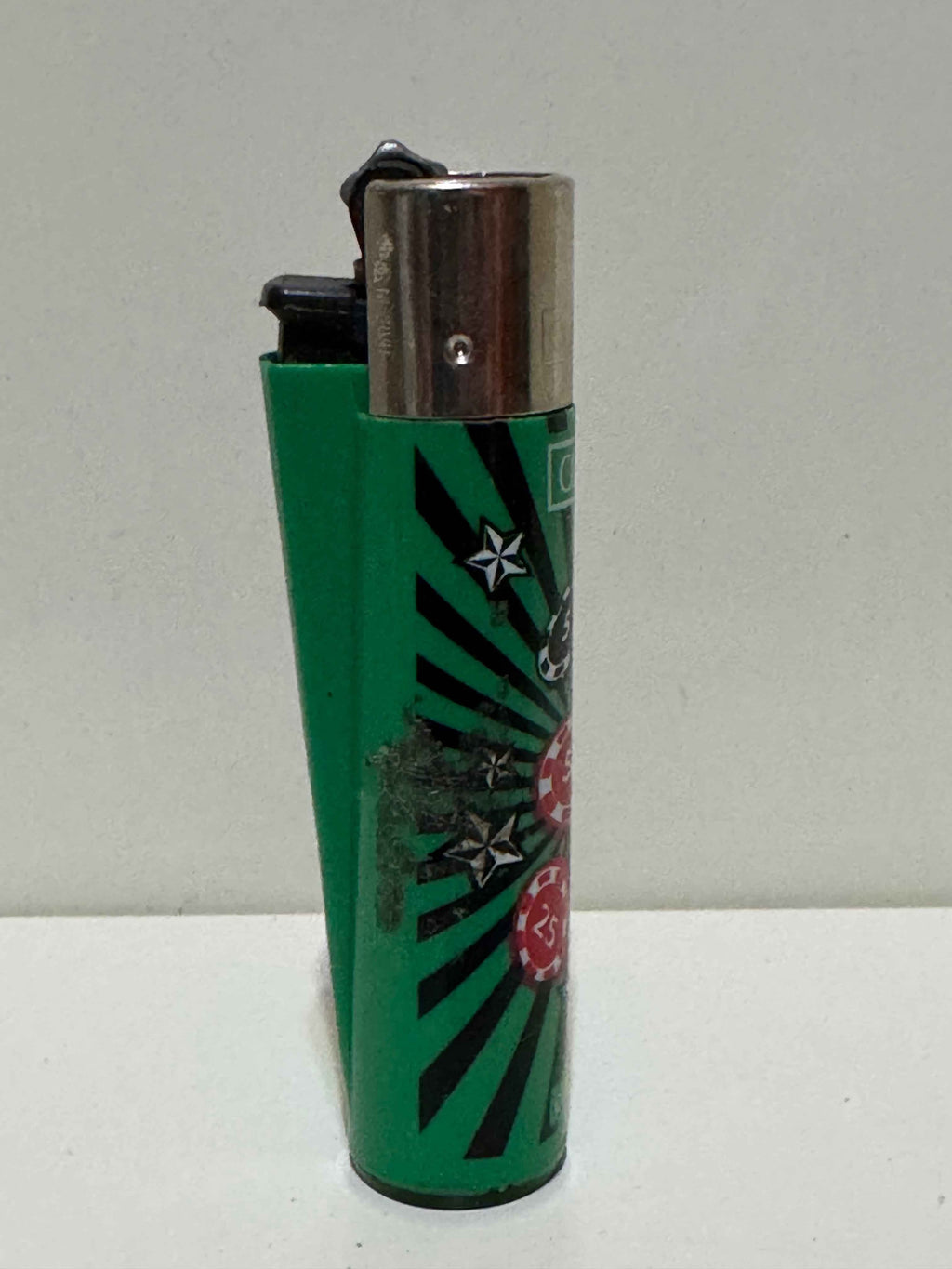 Clipper casino poker chip lighter – green pop-art design